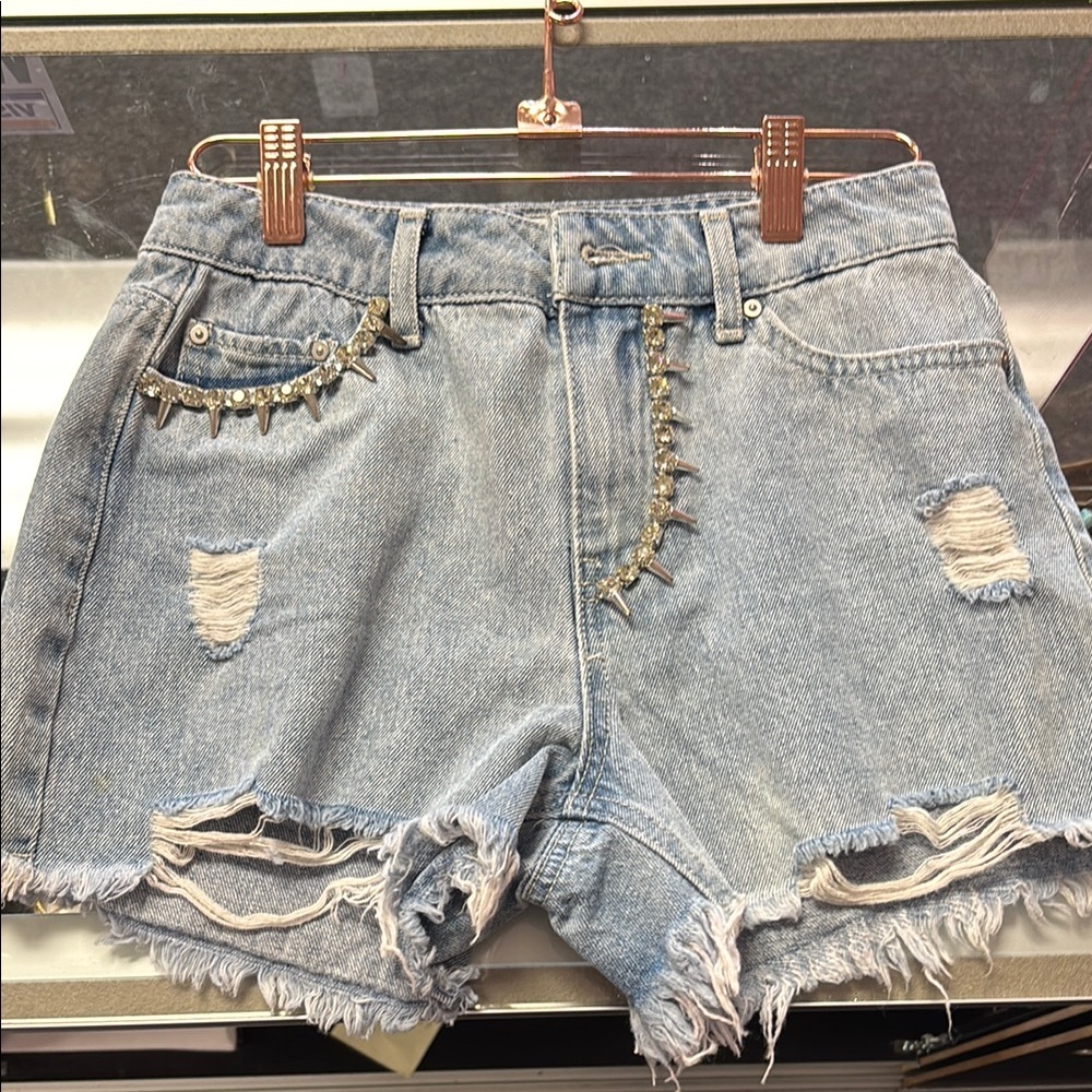Stylish Light Blue Denim Shorts with Distressed Details